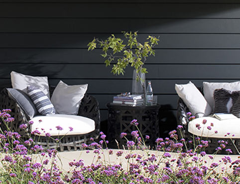 House exterior siding painted in Black Satin 2131-10 Regal® Select Paint color. House exterior siding painted in Black Satin 2131-10 Regal® Select Paint color.