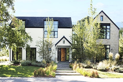 Modern country style home with white exterior and dark trim Modern country style home with white exterior and dark trim