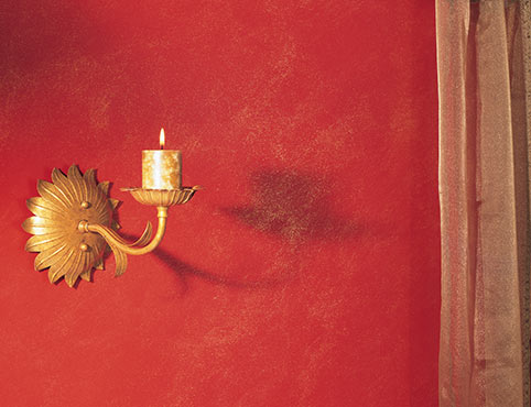 Red glitter wall with gold accents. Red glitter wall with gold accents.