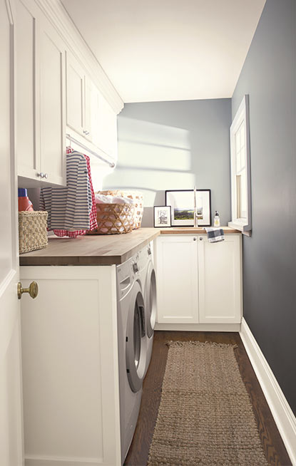 Laundry room walls painted in blue gray paint color with pearl finish Laundry room walls painted in blue gray paint color with pearl finish