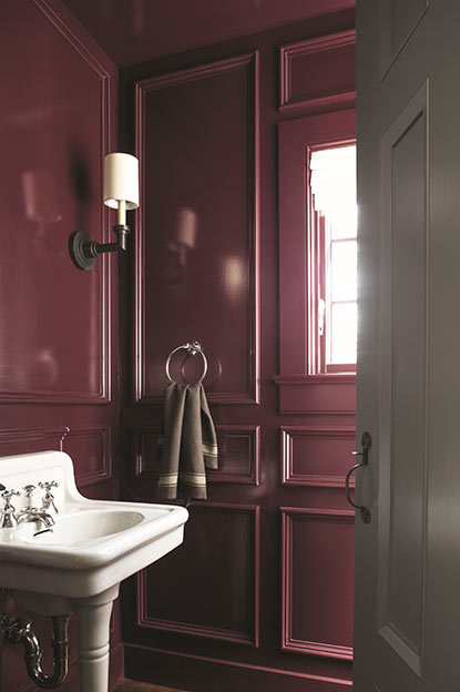 Bathroom walls painted in deep purple paint color in high gloss finish. Bathroom walls painted in deep purple paint color in high gloss finish.
