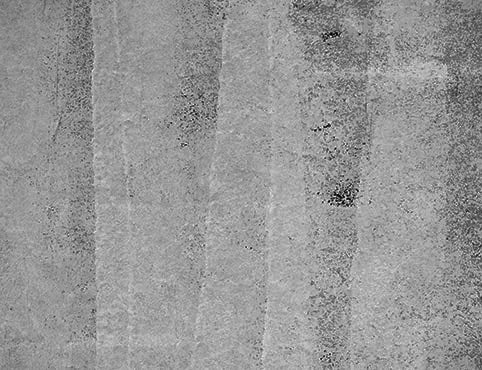 A close-up that shows paint lap marks on a wall. A close-up that shows paint lap marks on a wall.