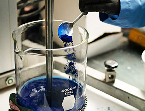 A chemist in the Benjamin Moore R&D lab works on the paint formulation for AURA Interior paint. A chemist in the Benjamin Moore R&D lab works on the paint formulation for AURA Interior paint.